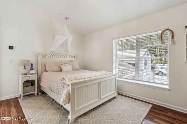 bedroom with wood-type flooring