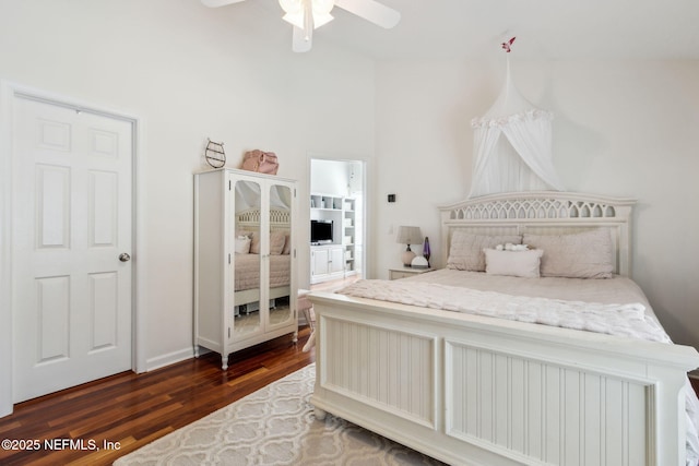 bedroom featuring dark hardwood / wood-style flooring and ceiling fan