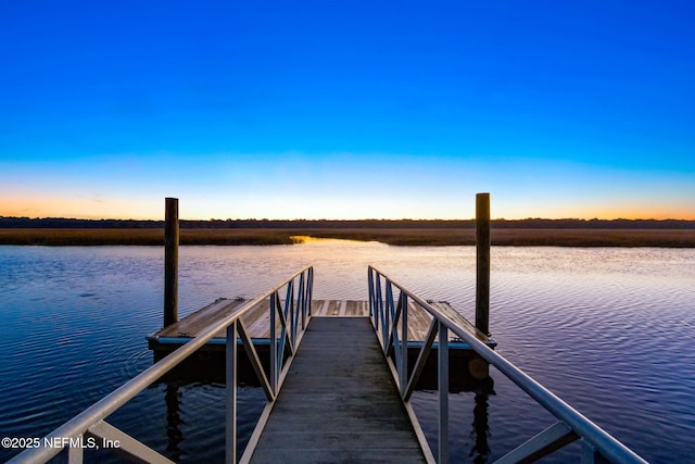 dock area featuring a water view