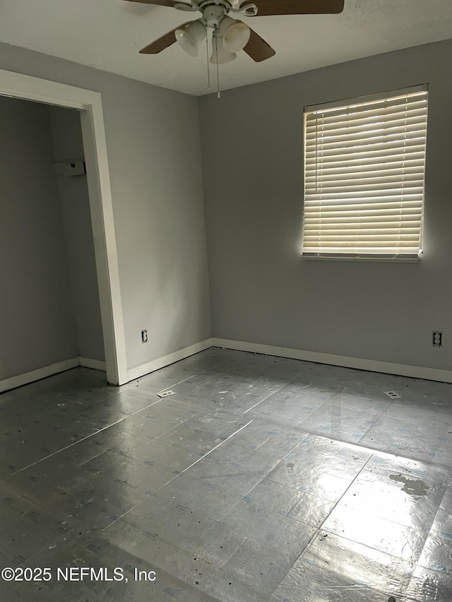 empty room featuring ceiling fan