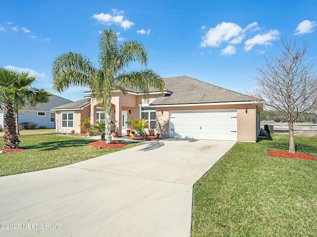 view of front of house featuring a garage and a front lawn