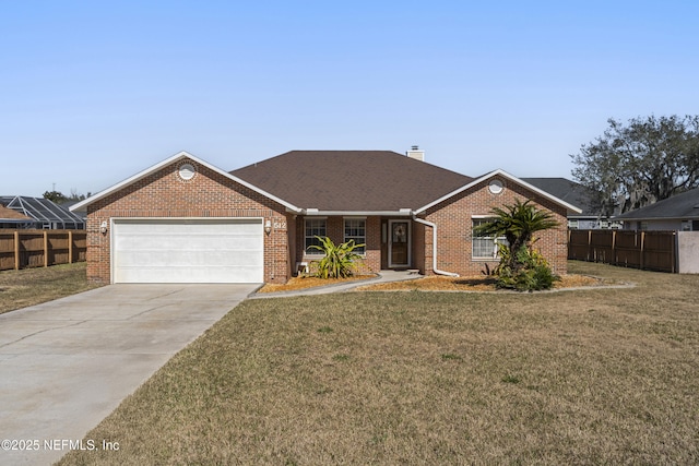 ranch-style house with a garage and a front lawn