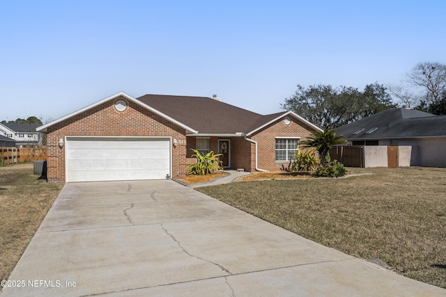 ranch-style house with a garage and a front lawn