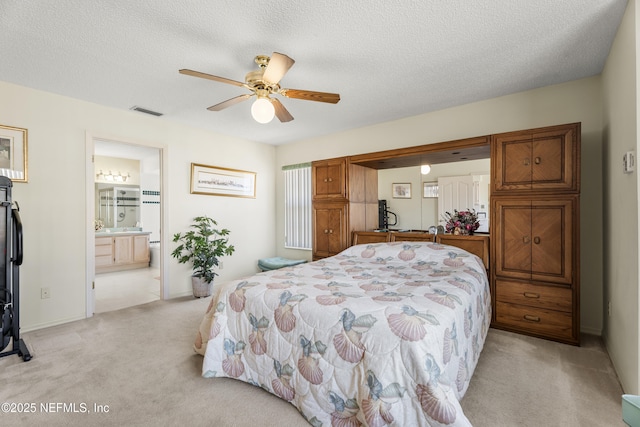 carpeted bedroom featuring a textured ceiling