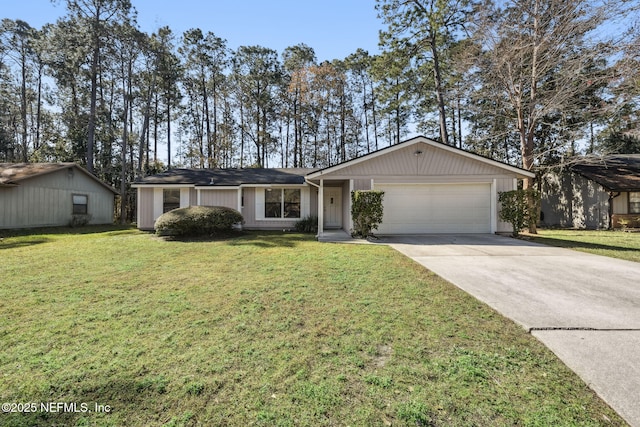 ranch-style house with a garage and a front lawn