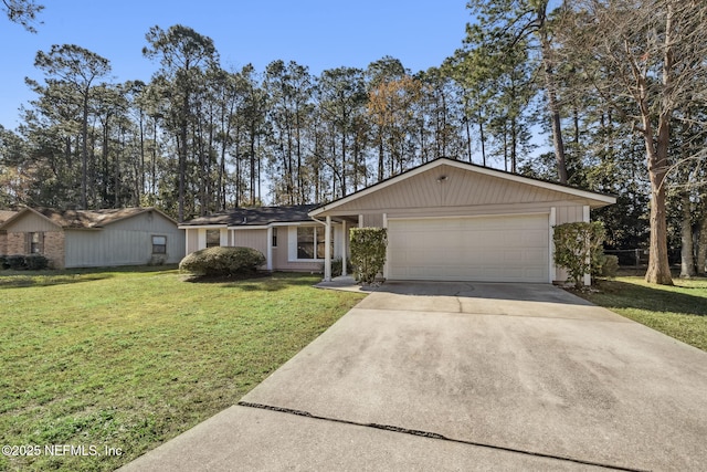 ranch-style house with a garage and a front yard