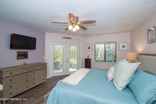 bedroom with french doors, a textured ceiling, dark hardwood / wood-style flooring, ceiling fan, and access to exterior