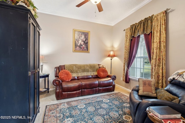 living room with light carpet, ceiling fan, baseboards, and crown molding