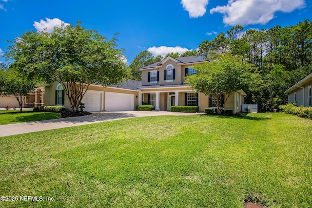 4250 Eagle Landing Pkwy, Orange Park, FL 32065 - view of front of home featuring stucco siding, driveway, a front lawn, and a garage