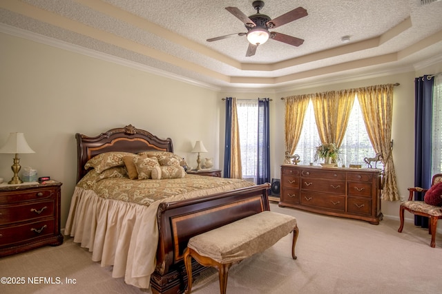 4250 Eagle Landing Pkwy, Orange Park, FL 32065 - bedroom featuring a tray ceiling, light colored carpet, ornamental molding, ceiling fan, and a textured ceiling