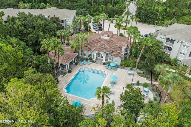 view of swimming pool with a patio