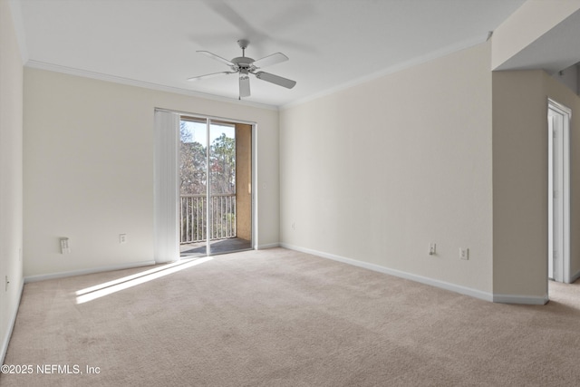 unfurnished room featuring ornamental molding, light carpet, and ceiling fan