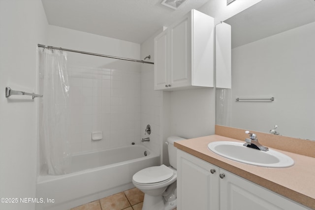 full bathroom with tile patterned flooring, vanity, shower / tub combo, and toilet