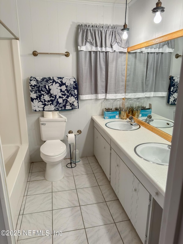 bathroom with tile patterned floors, toilet, and vanity