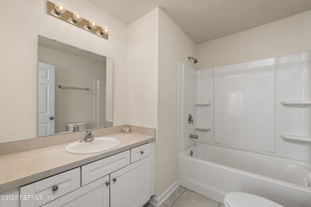 full bathroom with bathing tub / shower combination, vanity, a textured ceiling, tile patterned floors, and toilet