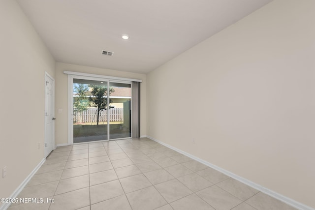 empty room featuring light tile patterned flooring