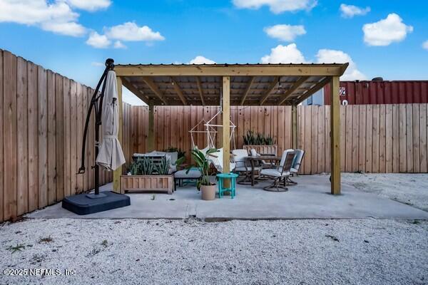 view of patio / terrace featuring a pergola