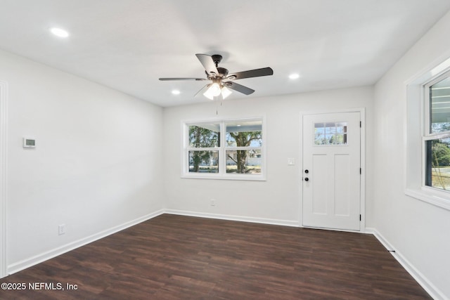 entrance foyer featuring ceiling fan and dark hardwood / wood-style floors