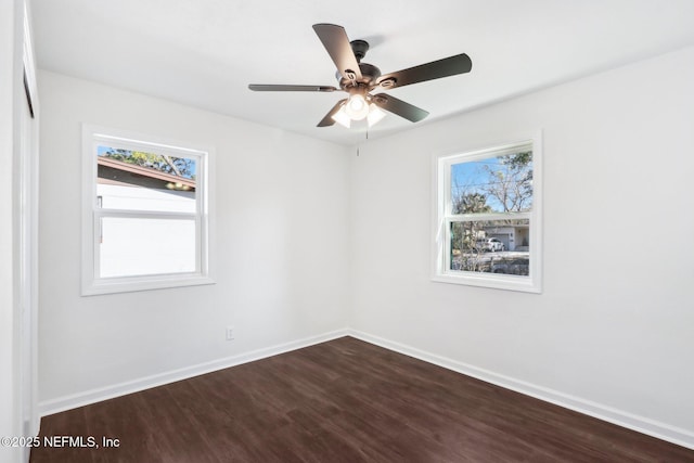 spare room with ceiling fan and hardwood / wood-style floors