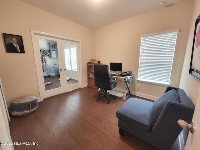 office area featuring hardwood / wood-style flooring, plenty of natural light, and french doors