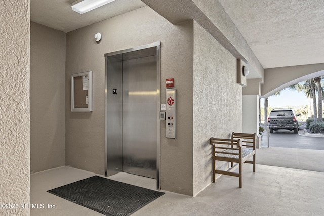 property entrance featuring elevator