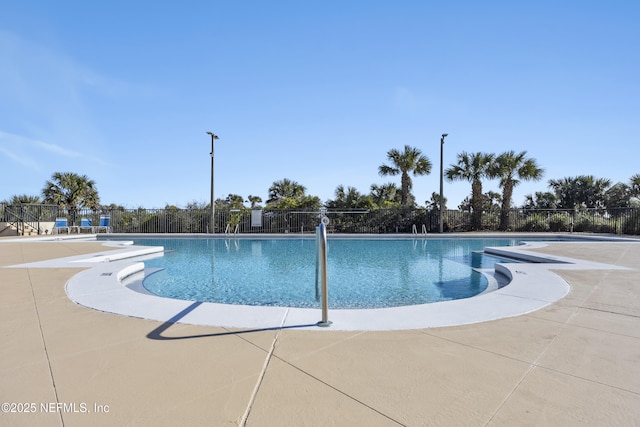 view of pool featuring a patio area