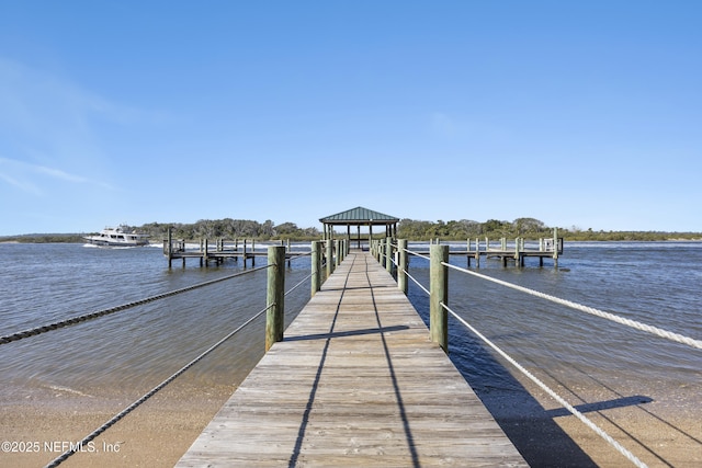 dock area featuring a water view and a gazebo