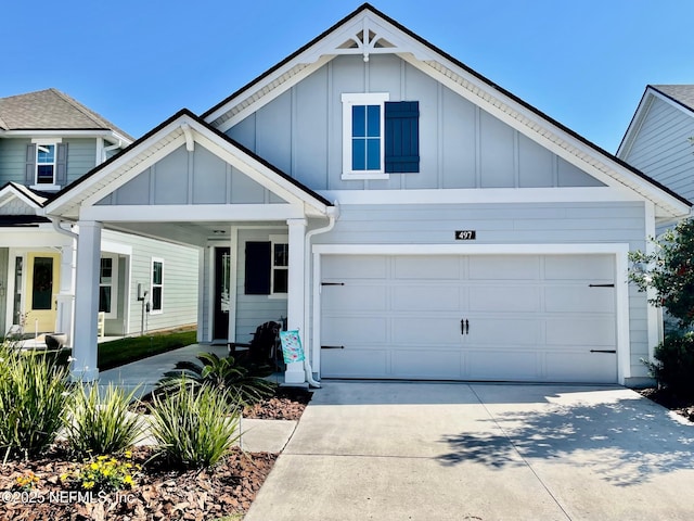 craftsman house with a garage