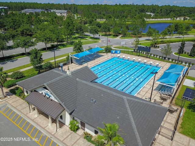 view of pool featuring a patio