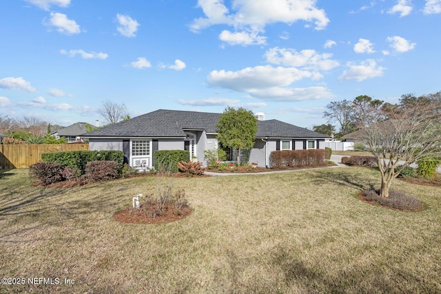 ranch-style home with a front yard