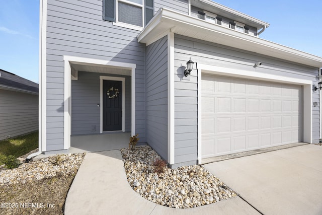 entrance to property with a garage