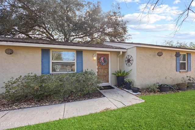 view of front of home with a front yard