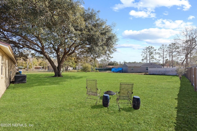 view of yard featuring central AC