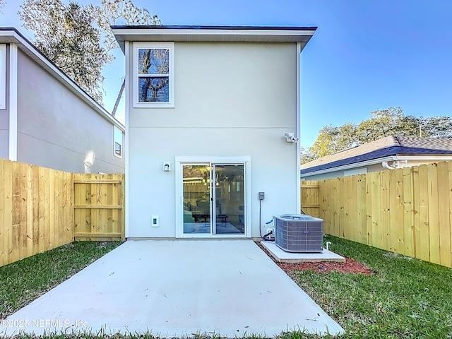 back of house featuring a patio and central AC unit