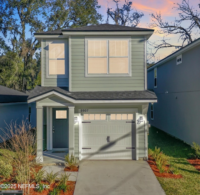 view of front of home featuring a garage