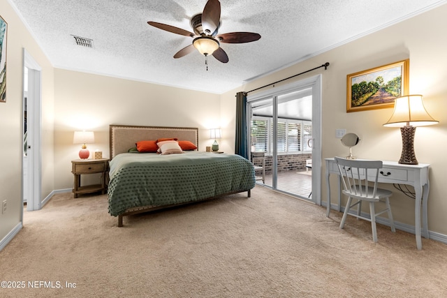 bedroom featuring light colored carpet, ornamental molding, access to exterior, and a textured ceiling