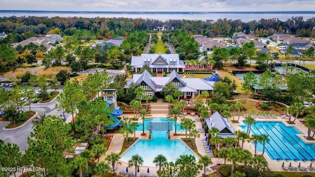 birds eye view of property featuring a water view