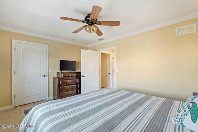 carpeted bedroom with crown molding and ceiling fan