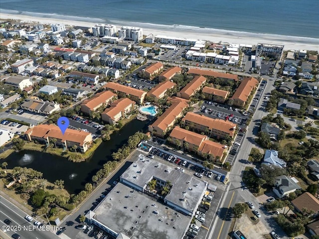 aerial view featuring a beach view and a water view