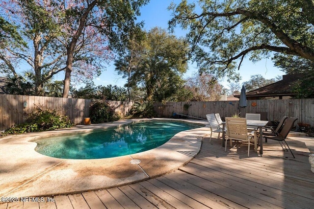 view of pool with a deck