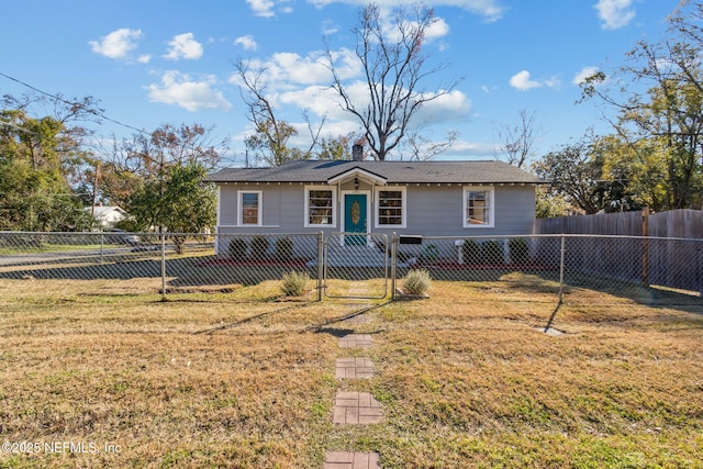 ranch-style house featuring a front lawn