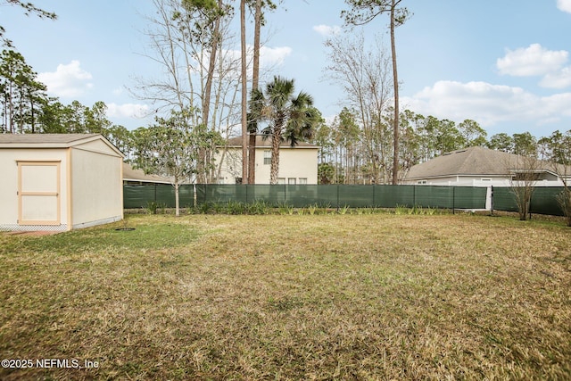 view of yard with a storage shed