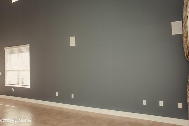 view of tiled spare room