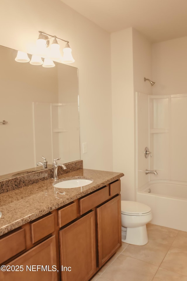 full bathroom featuring tile patterned flooring, vanity, tub / shower combination, and toilet