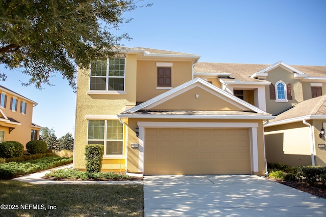 view of front of property featuring a garage