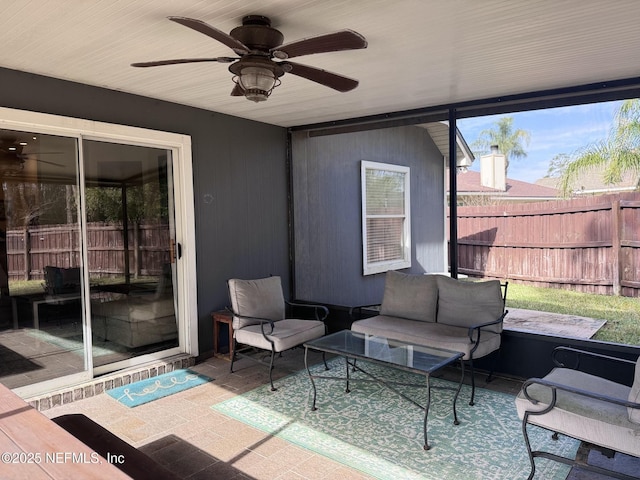 view of patio featuring outdoor lounge area and ceiling fan