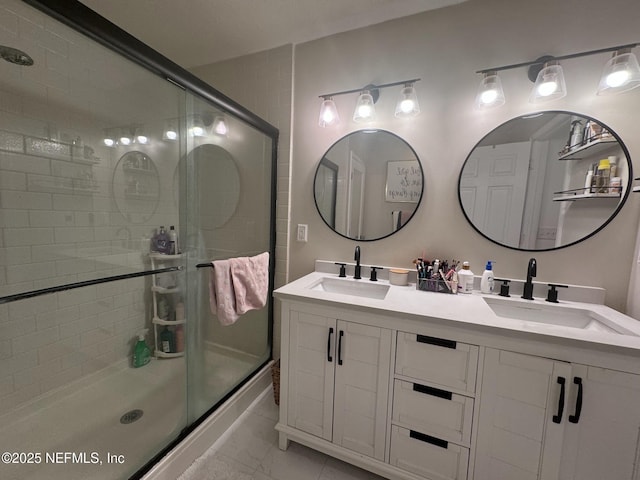 bathroom featuring tile patterned flooring, vanity, and an enclosed shower