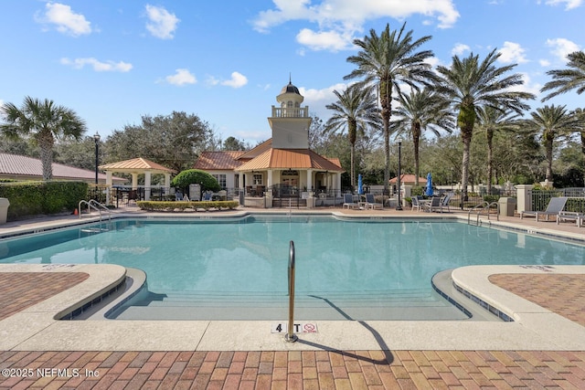 view of pool with a gazebo and a patio