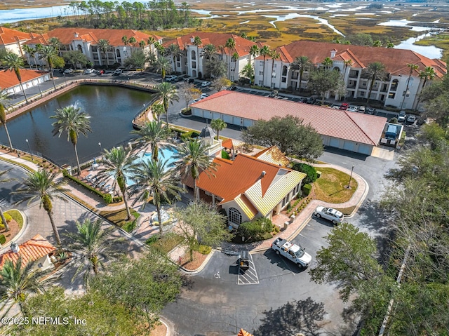 bird's eye view with a water view