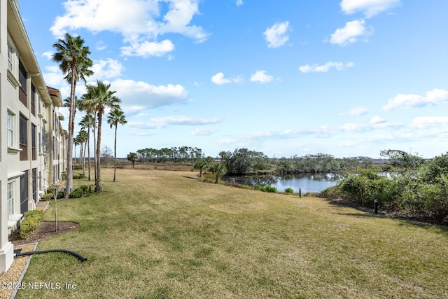 view of yard with a water view